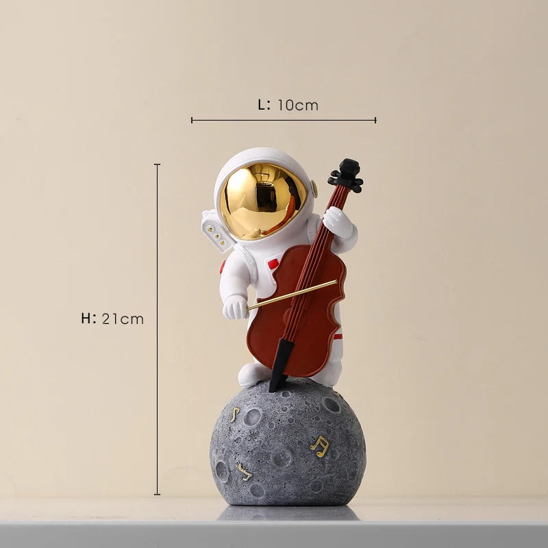 statue astronaute résine saxophone doré guitare violoncelle moderne décoration intérieure chambre salon