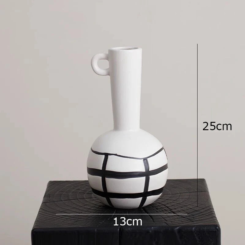 vase céramique rayures noires blanches moderne décoration intérieure arrangement fleurs artificielles minimaliste
