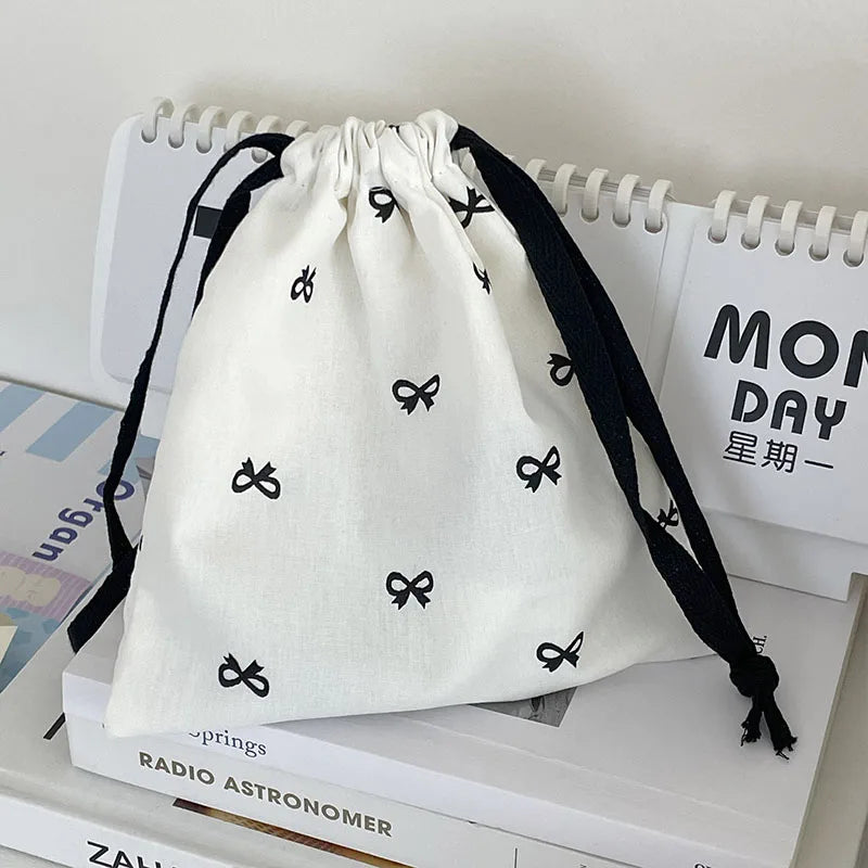 sac rangement toile réutilisable multi usages kawaii nœuds petits modernes blanc noir rose bleu