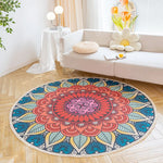 Un magnifique tapis rond coloré avec un motif de mandala décoratif, conçu pour apporter une touche d'élégance et de style à l'intérieur.