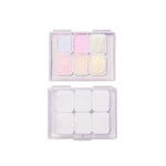 peintures aquarelle palette compacte bleu vert violet rose beige jaune blanc texture granuleuse opaques