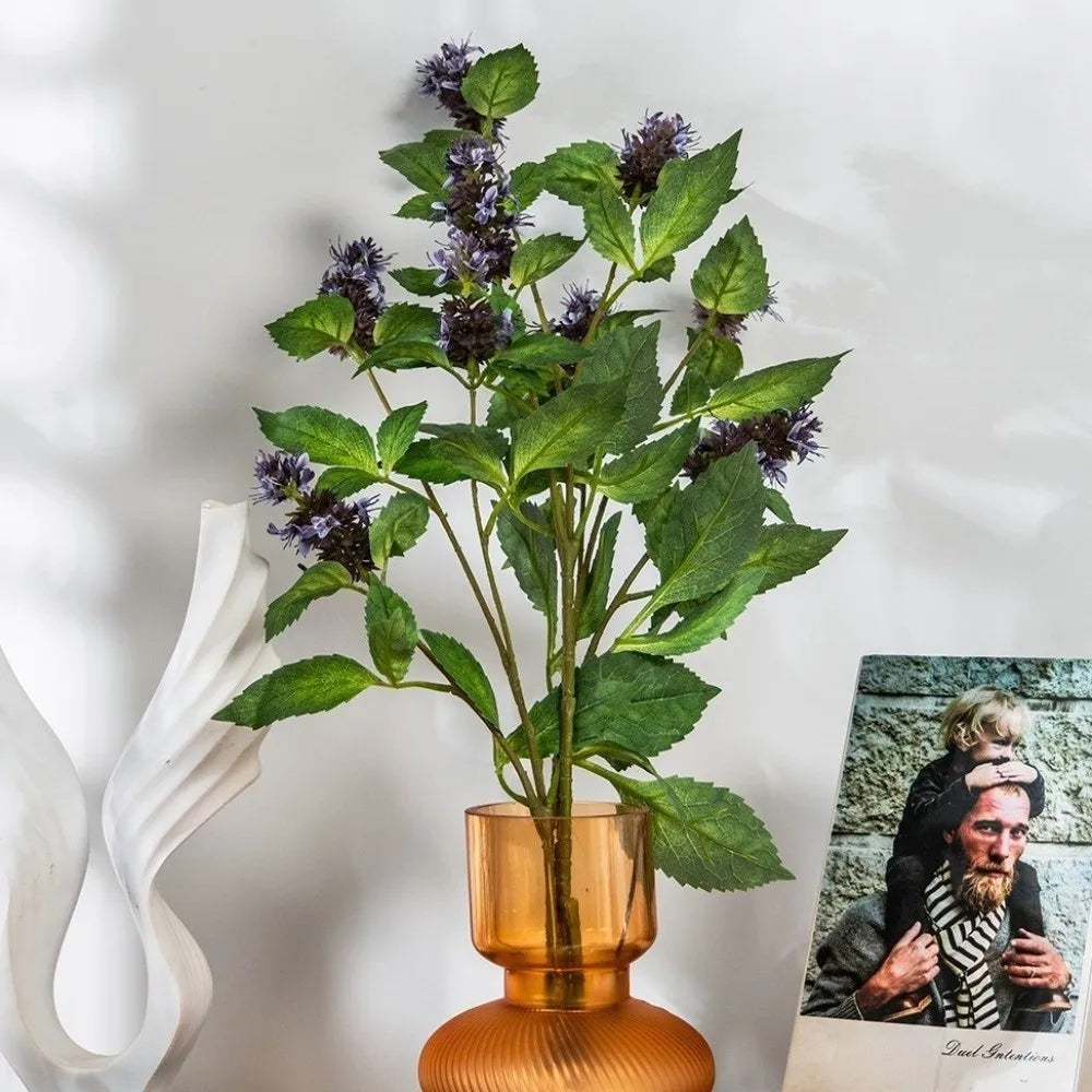 Bouquet artificiel moderne feuilles vertes fleurs violettes blanches décoration intérieure vase vert violet blanc