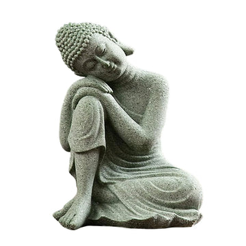 statuette bouddha assise gris vert texture pierre zen minimaliste abstraite galets mousse plateau noirscriçãopta