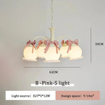 chandelier suspension vert pâle rubans roses abat jour translucides chambre enfant romantique