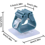 clips fixation adhésifs modernes balais ustensiles cuisine bleu gris blanc pratiques