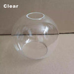 boule verre transparente ambre gris moderne anneau métallique suspension plafonnier lustre minimaliste