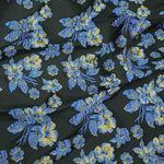 tissu polyester brodé fleurs relief noir vert bleu doré résistant opacité jacquard 165cm fleuri