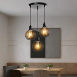 Suspension lumineuse industrielle moderne métal noir blanc abat jour rond grillagé