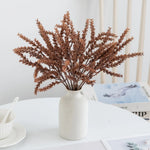 décoration intérieure bouquet feuilles artificielles naturel minimaliste beige gris doré