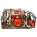 Maquette serre-livres éclairée dans un intérieur cosy