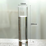 vase verre transparent moderne base bois fleurs artificielles inclusion chambre
