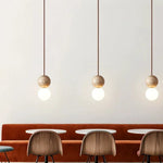 suspension lumineuse moderne pierre blanc beige doré texture granulée interrupteur bouton led 3000k 7w