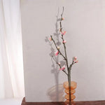 décoration intérieure bouquet fleurs prunier artificielles rose blanches vase transparent minimaliste asian