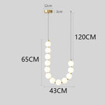 suspension lumineuse moderne minimaliste cactus blanc opalescent câbles dorés chambre salon