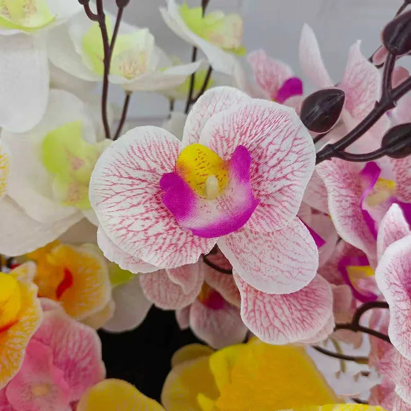 décoration intérieure bouquet fleurs artificielles orchidées modernes élégantes blanc rose jaune rouge salon chambrehôtel