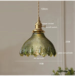 suspension lumineuse vintage vert doré motifs géométriques ampoules câbles chaînes métal