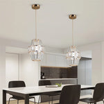 Suspension lumineuse moderne transparente facettes géométriques câble doré élégante chambre salon