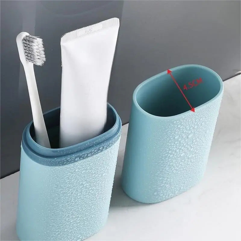 tasse pliable moderne brosse dents crème dentifrice blanc rose bleu gris texture goutte'eau