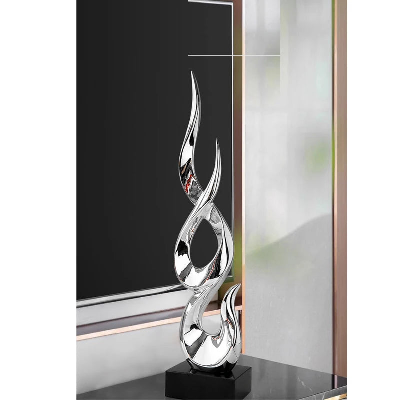 sculpture abstraite moderne rouge or argent noir torsadée fluidesDecoration intérieure résine haute qualité