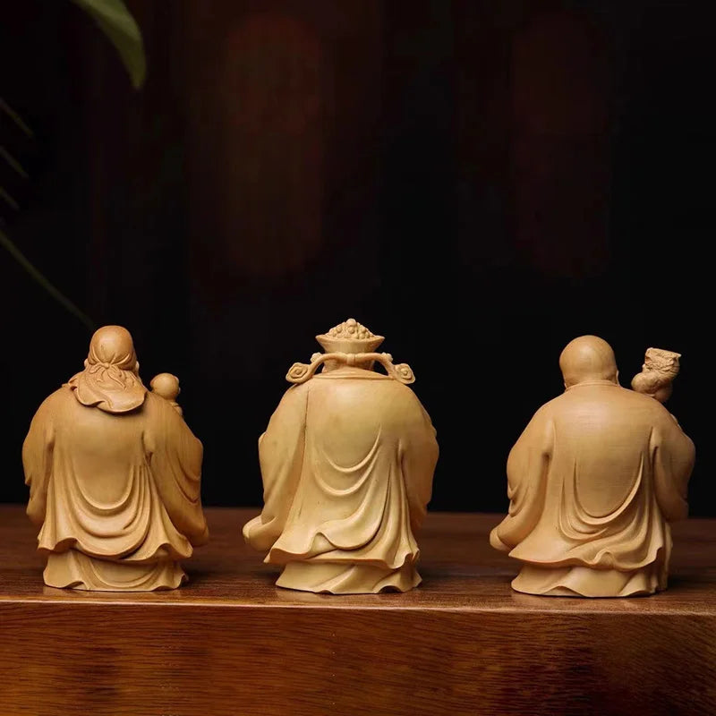 statues sculptées bois naturel artisanal traditionnel trois pièces bébé motifs floraux géométriques maison chambre