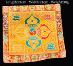 serviettes traditionnelles multicolores brodées motifs floraux géométriques opaques