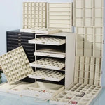coffret bijoux moderne simili cuir noir blanc vert compartiments poignées dorées stockage sécurité