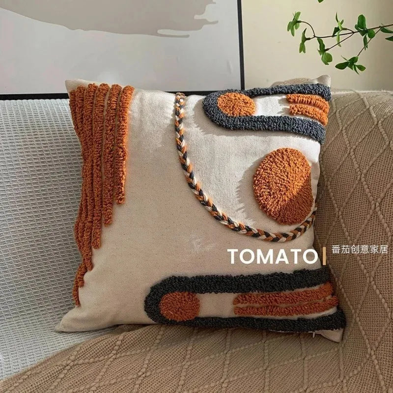 taies d'oreiller géométriques brodées boho chic couleurs beige orange gris franges respectueuses environnement decoration