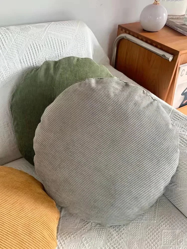 housse coussin ronde velours côtelé rayures horizontales décoration canapé salon moderne rose pâle