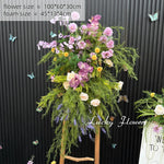 décoration murale naturelle composition florale variée couleurs vives rustique bienvenue mariage