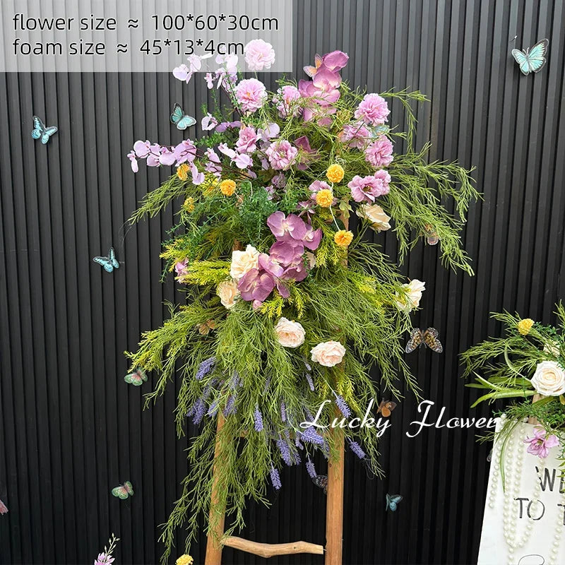 décoration murale naturelle composition florale variée couleurs vives rustique bienvenue mariage