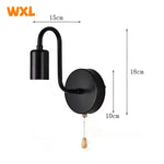 lampe murale moderne fer noir fixe 15cm largeur 18cm hauteur interrupteur ampoule