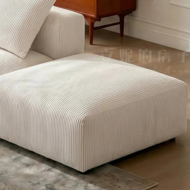 canapé modulable moderne beige clair rayures horizontales convertible cause cœur lit salon