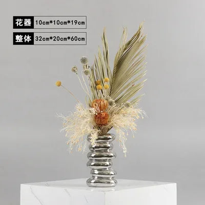 vase moderne argenté brillant fleurs artificielles blanches vertes décoration maison