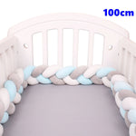 coussin noué bébé tissu doux texture tressée beige clair moderne confortable sécurité chambre anti