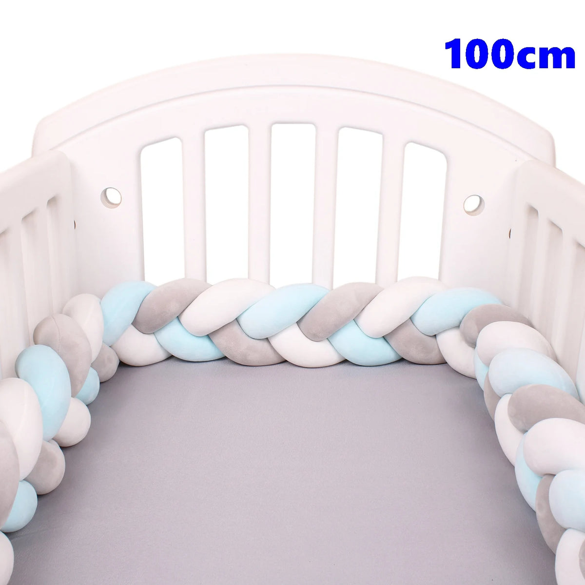coussin noué bébé tissu doux texture tressée beige clair moderne confortable sécurité chambre anti