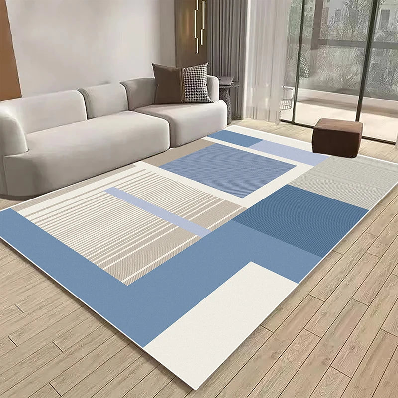 Un tapis géométrique aux teintes bleues et beiges, créant un design épuré et harmonieux dans ce salon moderne.