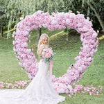 Arche fleurs rose romantique décoration extérieure mariage anniversaire événement table