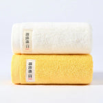 serviettes bain coton douces absorber vert clair jaune gris orange blanc texture duveteuse moderne