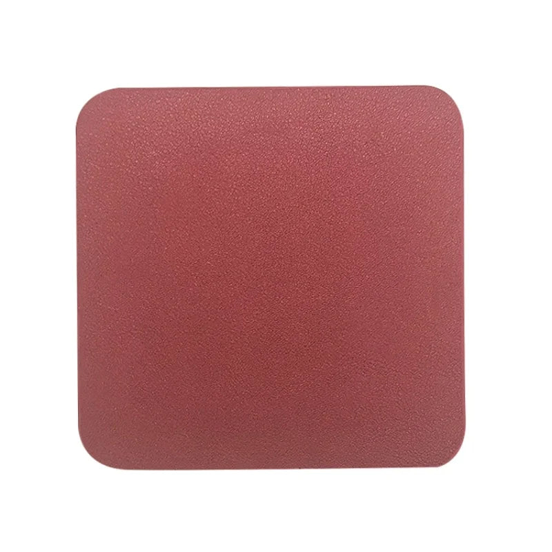 Carré de couleur rose saumon mat, avec une texture de surface uniforme.