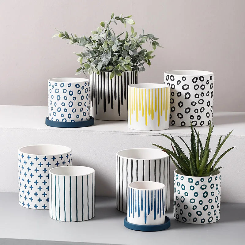 cache pot céramique blanc bleu motif géométrique moderne plante fleur intérieur salon