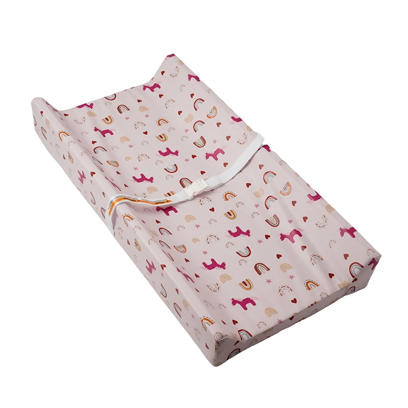tapis changement bébé beige bleu clair imprimé dinosaures poissons ceinture sécurité moderne pratique