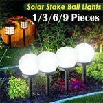 lampe solaire moderne sphérique translucide blanc noir énergétique extérieure jardin épingle détachable panneau solaire