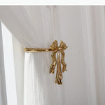 boucles rideau or ailes sculptées classiques décoratives noels dorés deux pièces