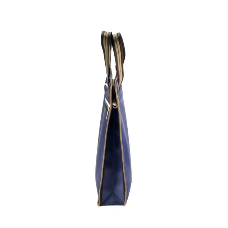 sac main moderne bleu géométrique poignées métalliques carnet stylo papier ruban