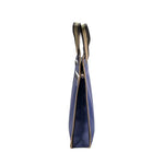 sac main moderne bleu géométrique poignées métalliques carnet stylo papier ruban