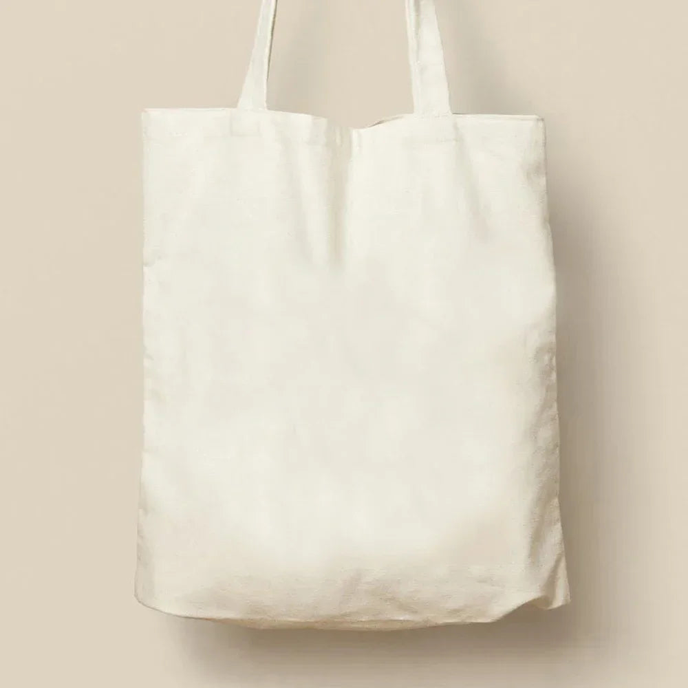 sac main toile beige motif floral ouvert minimaliste poignées fourre tout décontracté