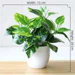 décoration extérieure plante artificielle verte feuilles simples moderne pot blanc accrochable branchu exposition anniversaire