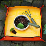 tapis pliant jardinage utilitaire pots fleurs outils transplantoir griffe terreau sansevieria