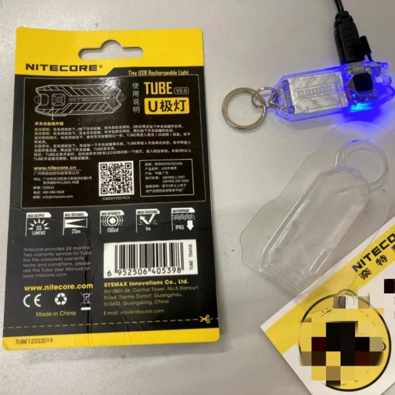 lampe torche rechargeable compacte moderne bleu noir orange logo nitecore anneau métallique certifiée ccc