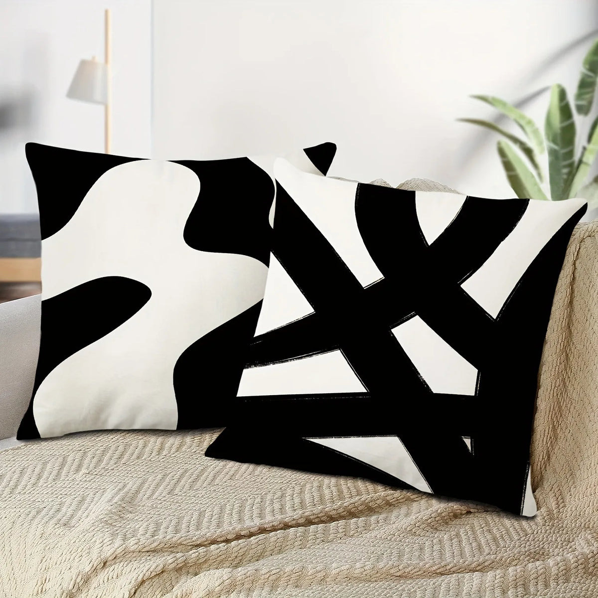 taies d'oreiller imprimées motif abstrait noir blanc contemporaines 45x45cm opaques maison hospitalière
